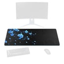 grand tapis de souris fleur bleue
